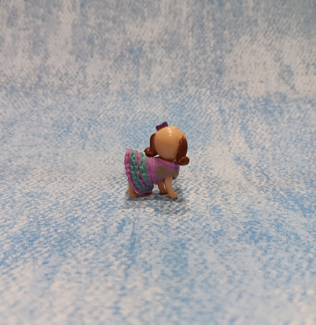 Polly Pocket Puppy Pal Wearing a Purple Dress