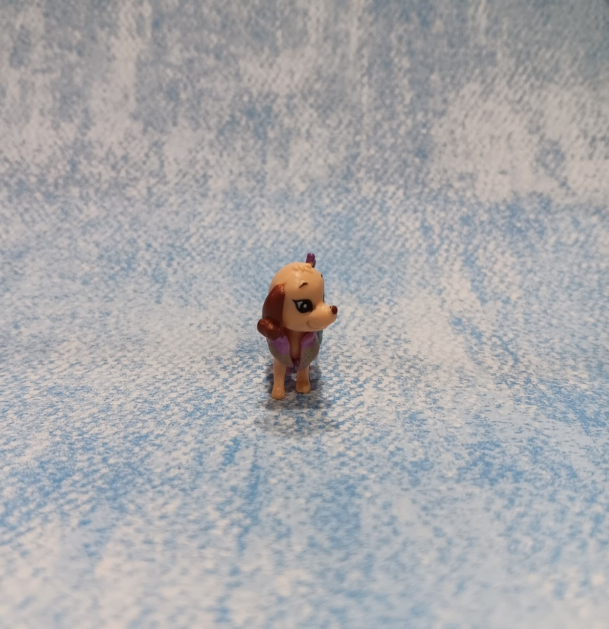 Polly Pocket Puppy Pal Wearing a Purple Dress