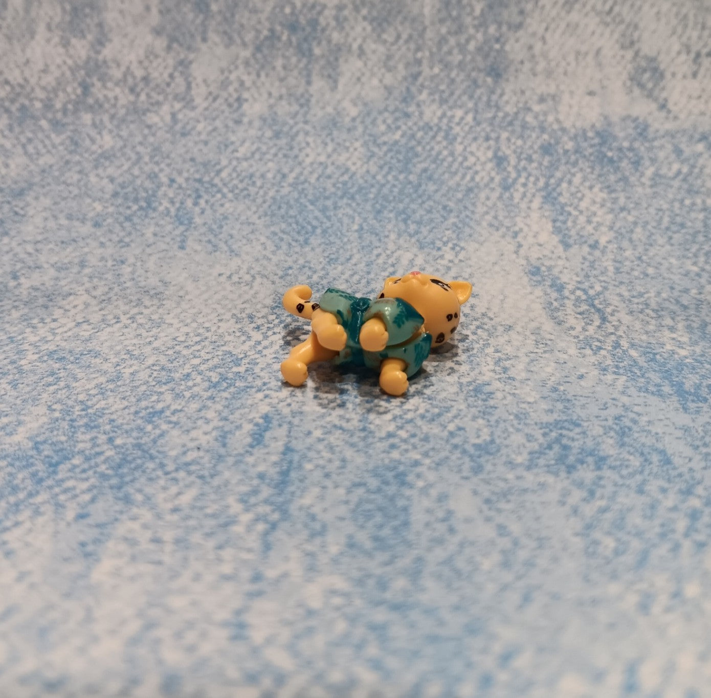 Polly Pocket Leopard Pet Wearing a Green Robe