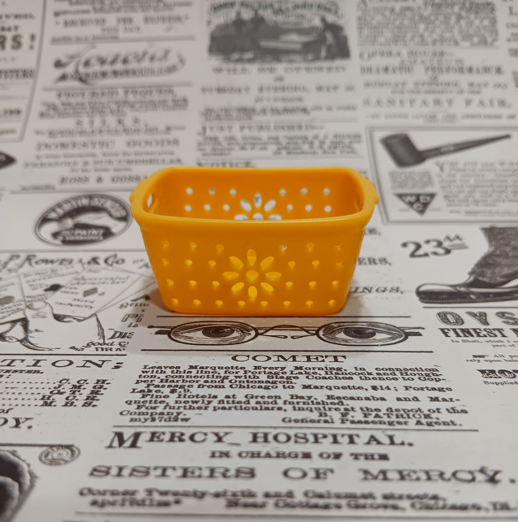 Barbie's Yellow Plastic Laundry Basket
