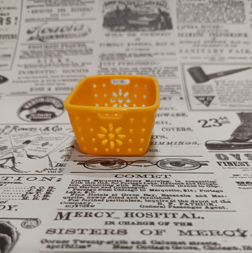 Barbie's Yellow Plastic Laundry Basket