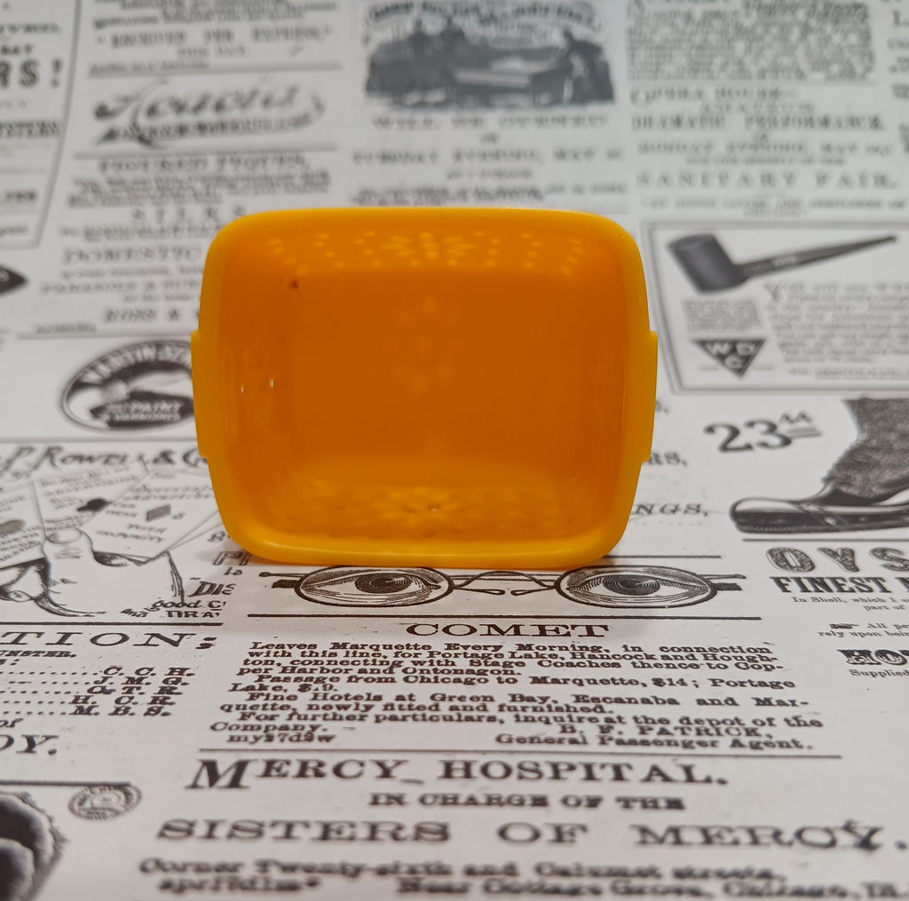 Barbie's Yellow Plastic Laundry Basket