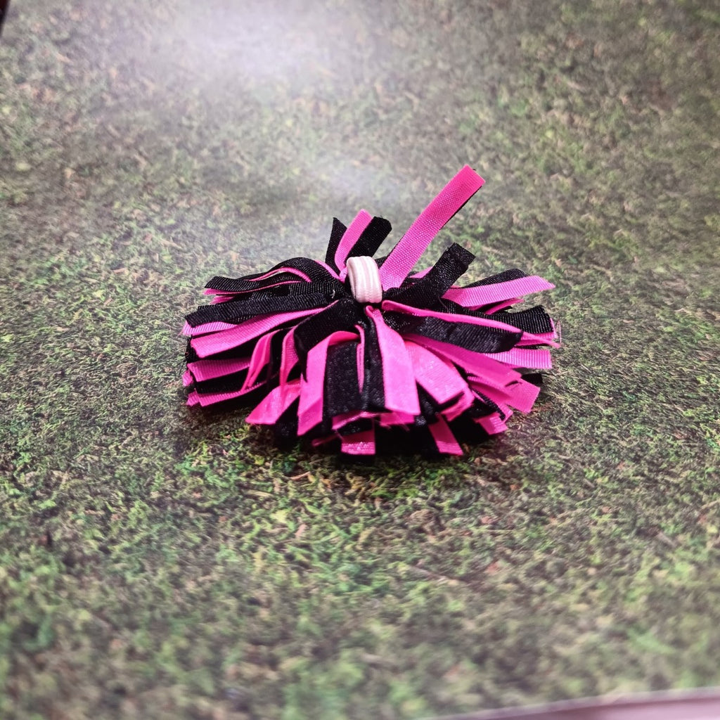 Skipper's Black and Pink Pom Pom
