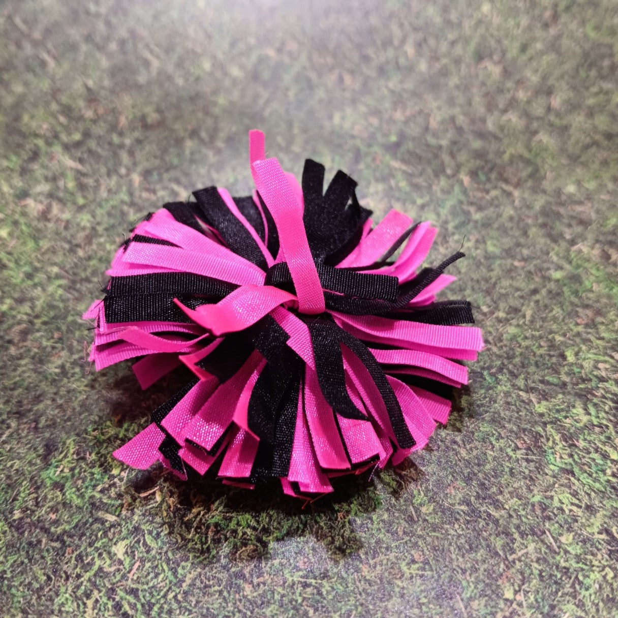 Skipper's Black and Pink Pom Pom